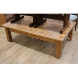 A large pine coffee table W.152cm