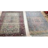A Caucasian rug with triple medallion on a blue ground and two worn Persian rugs 210 x 120cm, 205