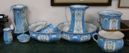 Ford & Sons, Crownford, Burslem, an eight-piece toilet set decorated with stylised cornflowers