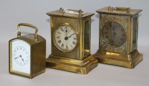 Three French brass carriage clocks, one striking on gong and having arched in enamelled Arabic dial,