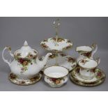 A Royal Albert Old Country Roses teaset and cake stand