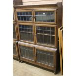 A Minty oak leaded glass bookcase W.89cm