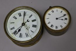 A French brass drum clock with Roman dial and a smaller similar example, H 13.5cm & 11.5cm