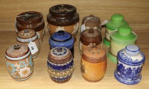 Twelve Doulton tobacco jars and covers, various designs