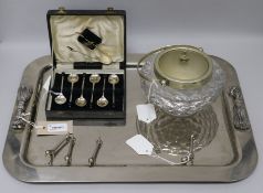 A plated tray with cast 'tassel' handles, a set of plated bean-end coffee spoons, cased, knife rests