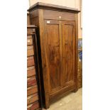 A walnut two door cupboard W.97cm