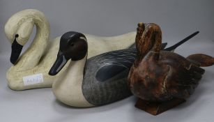 Three wooden decoy ducks largest width 47cm height 20cm