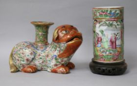 A Japanese Kutani porcelain lion dog candlestick, enamelled and gilt decoration and a Canton vase