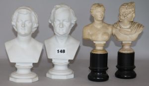 A pair of 19th century plaster busts after the Antique and two biscuit porcelain busts tallest