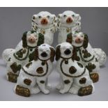 Three pairs of graduated Staffordshire pottery dogs tallest 33cm