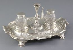 A Victorian silver inkstand by Martin, Hall & Co, with scroll handles, engraved and embossed