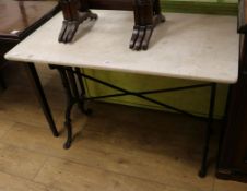 A marble topped Parisian bistro table W.100cm