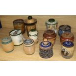 Twelve Doulton tobacco jars and covers, various designs