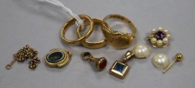 Two 22ct gold bands, and 18ct gold signet ring and other minor items.