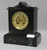 A slate mantel clock with key and pendulum height 29cm