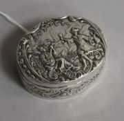 A late 19th century German Hanau white metal repousse oval box by Gebruder Glaser, the interior with