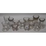 A group of twelve firing glasses tallest 10cm