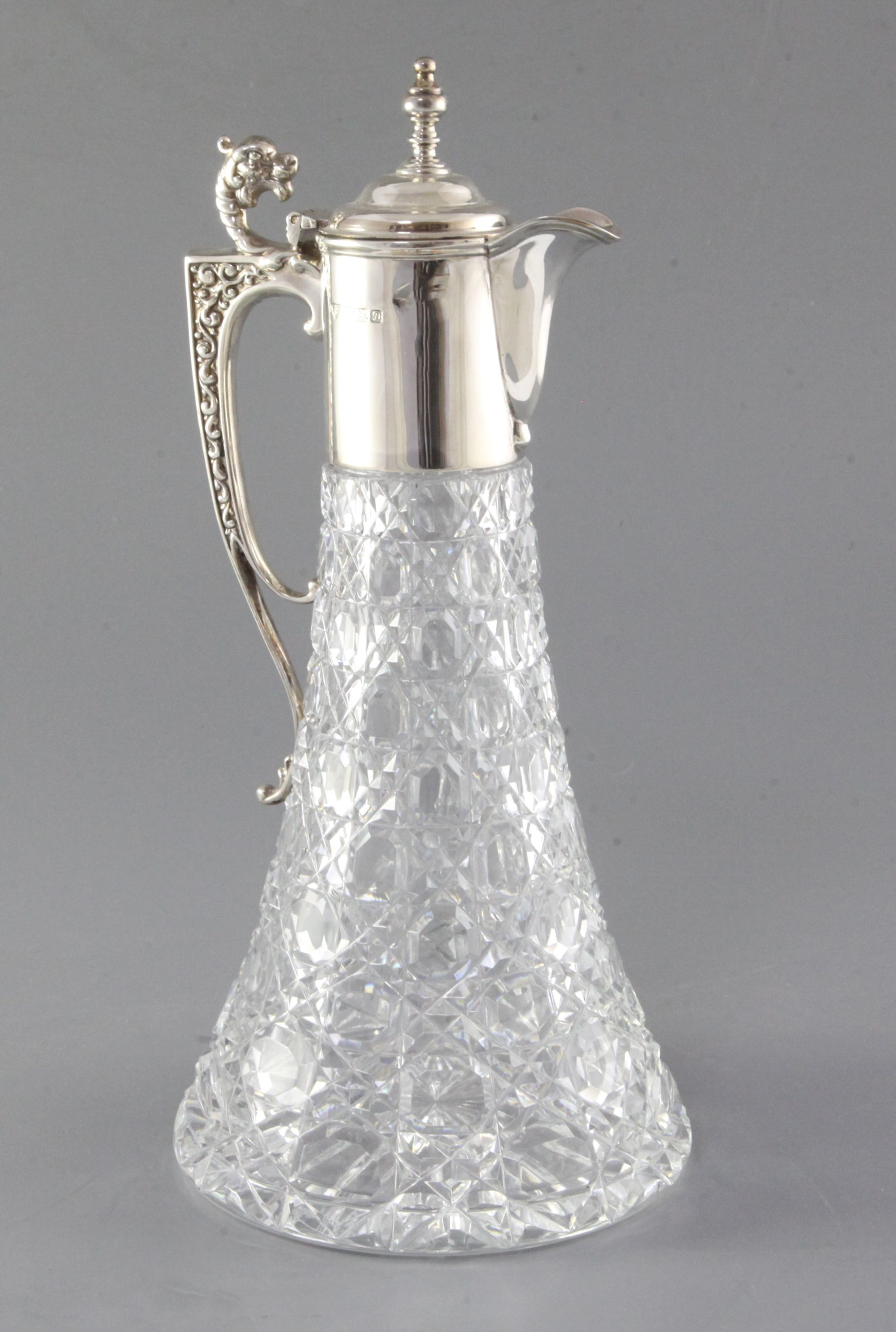 A 1970's silver mounted cut glass claret jug by Garrard & Co Ltd, of tapered conical form,