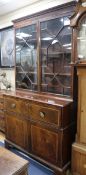 A George III mahogany secretaire bookcase W.125cm