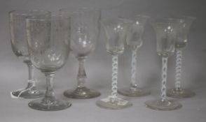 Four cotton-twist stem glasses with bell-shaped bowls and three engraved goblets (7) cotton twist