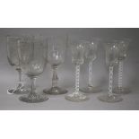 Four cotton-twist stem glasses with bell-shaped bowls and three engraved goblets (7) cotton twist