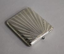 An Estonian 875 white metal cigarette case with cabochon thumbpiece, 10.2cm.