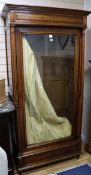 A 19th century French mahogany armoire, enclosed by a glazed door W.105cm