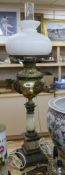 A brass and green onyx oil lamp height 95cm