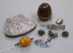 Mixed items including and amber bead brooch, a white metal compact, a modern silver miniature