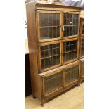 A Minty oak leaded glass bookcase W.90cm