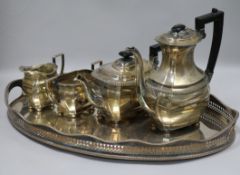 A plated tea set with tray