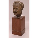 A mid 19th century terracotta head of a man, on stand overall height 29cm