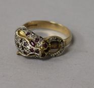 A modern 9ct gold and gem set "leopard's head" dress ring, size M.