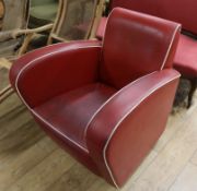 A 1960's red leather club armchair