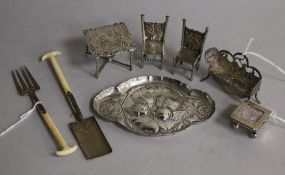 A collection of Continental silver miniature furniture and other small silver items, comprising a