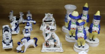 A set of Toby pottery condiments, 8 Wilfred Gibson figures, and 3 Fairings tallest 16cm