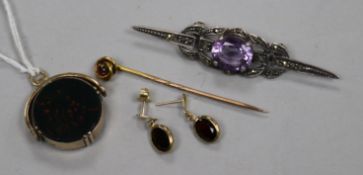 A 9ct gold and garnet stick pin, a pair garnet earrings, a yellow metal fob and a silver and