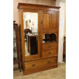 An Edwardian walnut wardrobe W.127cm