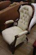 A Victorian walnut armchair