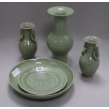 A group of Chinese celadon glazed porcelain vases and two dishes tallest vase 25cm