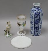 A Bohemian glass vase, a Royal Copenhagen plaque, a Derby figure and a Delft vase