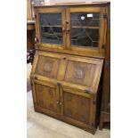 A 1920's oak bureau bookcase W.88cm