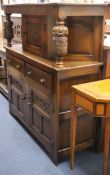 A 17th century style carved oak court cupboard W.127cm