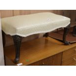 A cabriole leg foot stool W.75cm