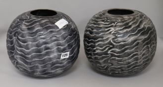 A pair of modern patinated bronze vases