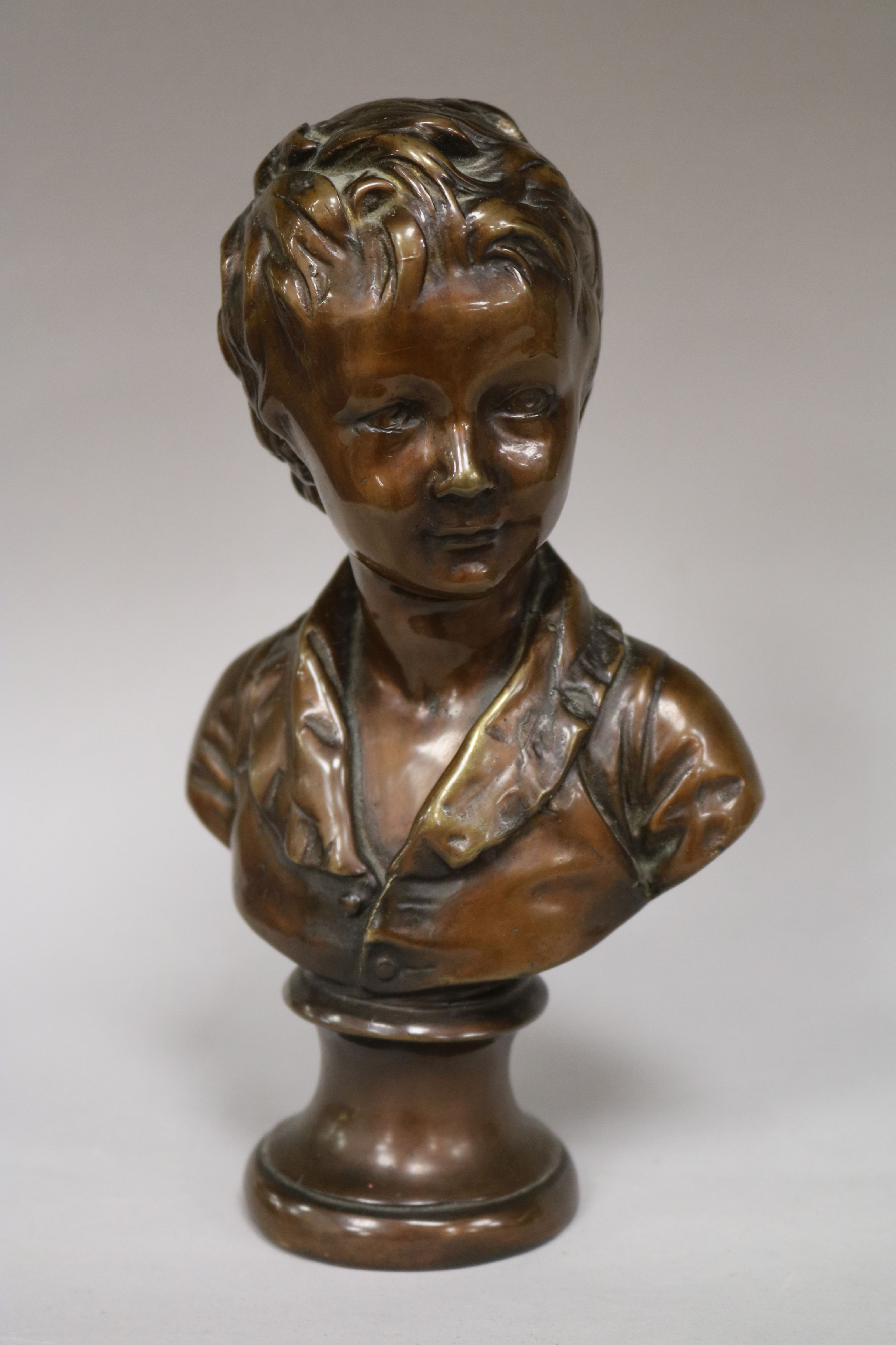 A bronze bust of a youth height 20cm