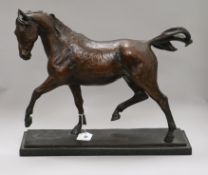 A bronze model of a trotting mare height 37cm width 44cm