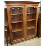 An Edwardian glazed bookcase W.135cm