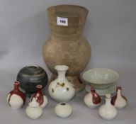 A group of Studio pottery vases and a large terracotta vase