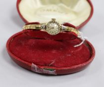 A lady's Rotary Maximus 18ct gold and diamond wristwatch, in original case.